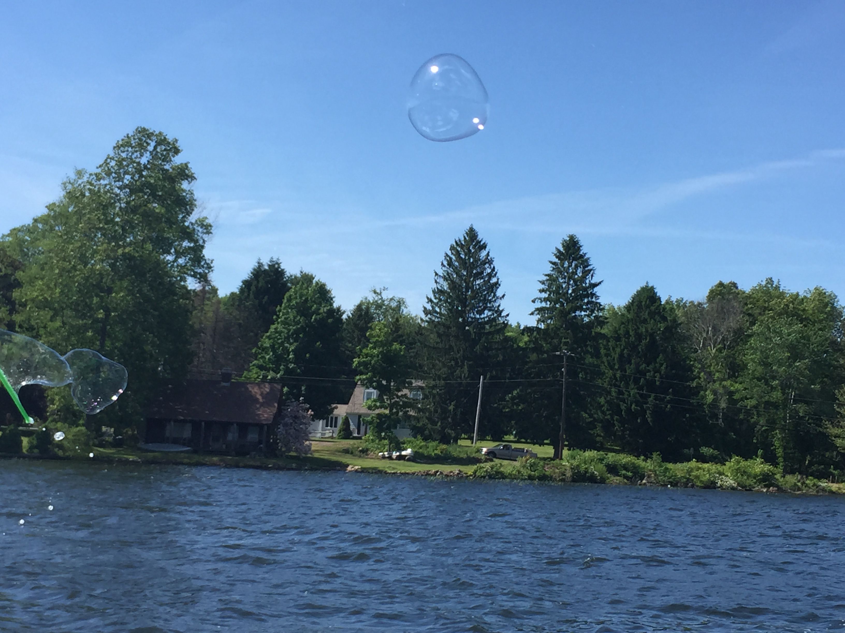 image of lake with bubbles in the background